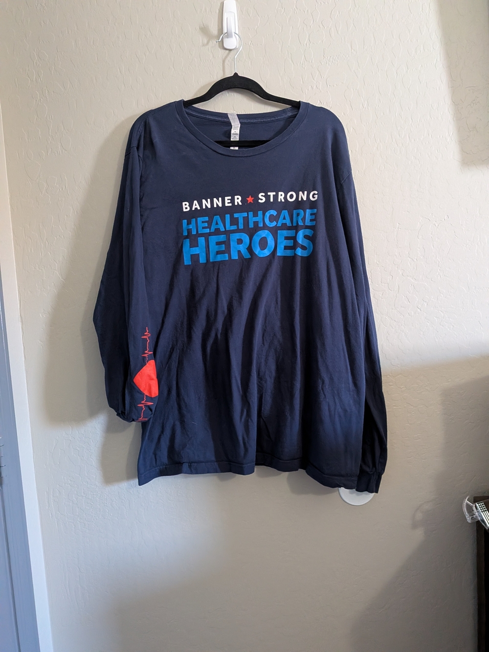 Banner Health Navy Blue Tee with White Neck Label
